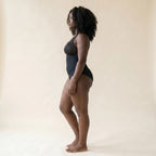 Body gainant maintien fort noir, vue de profil