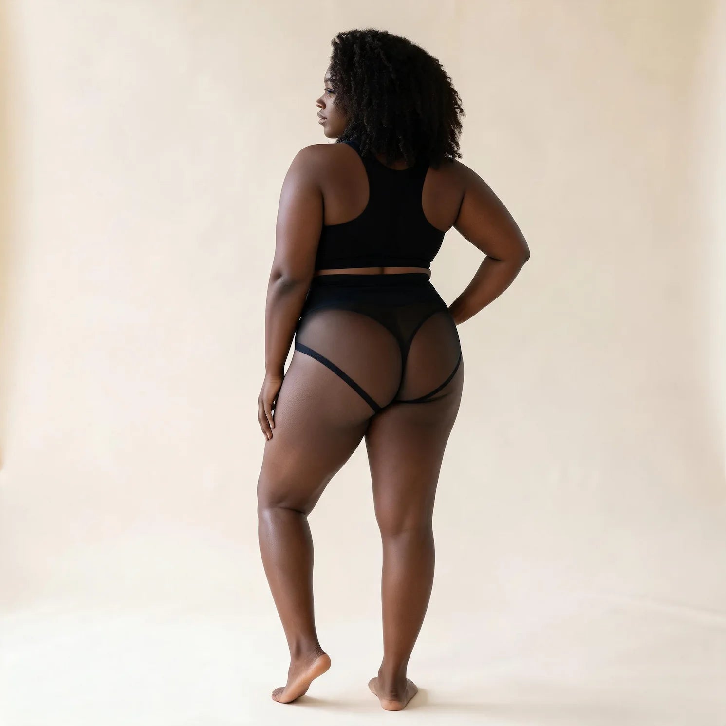 Culotte sculptante noir, vue de dos compression ferme
