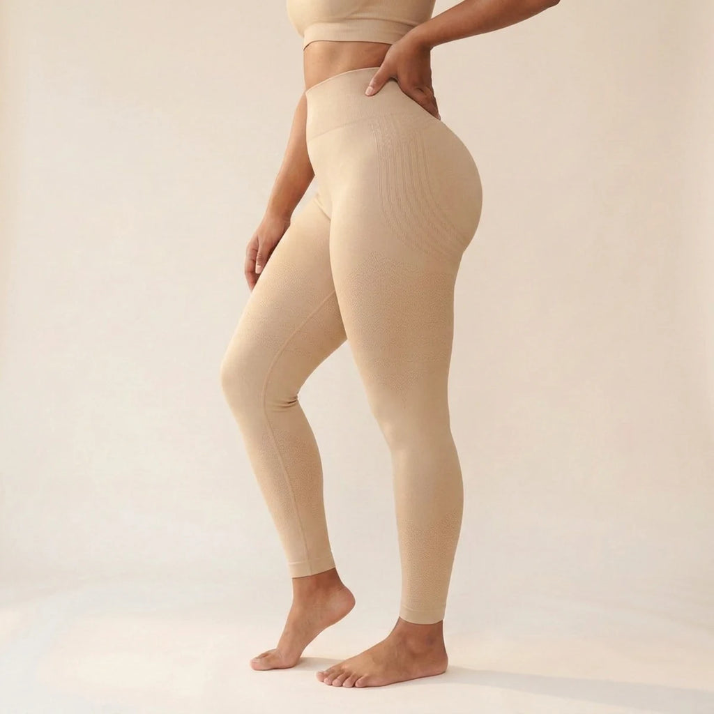 Elya beige tummy control leggings, side view — sculpted silhouette, shaping high waist, second skin