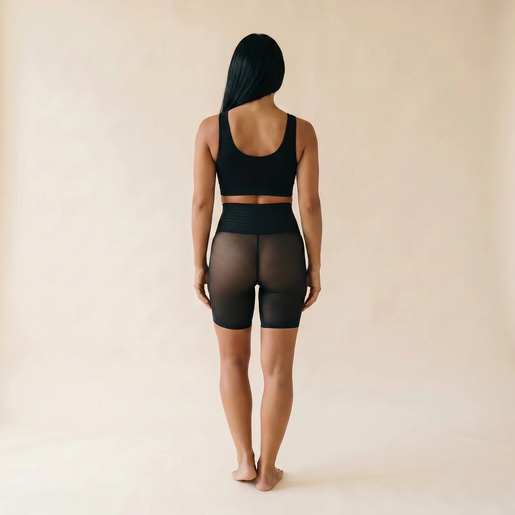 Panty anti-frottement noir vu de dos, maille voilée invisible