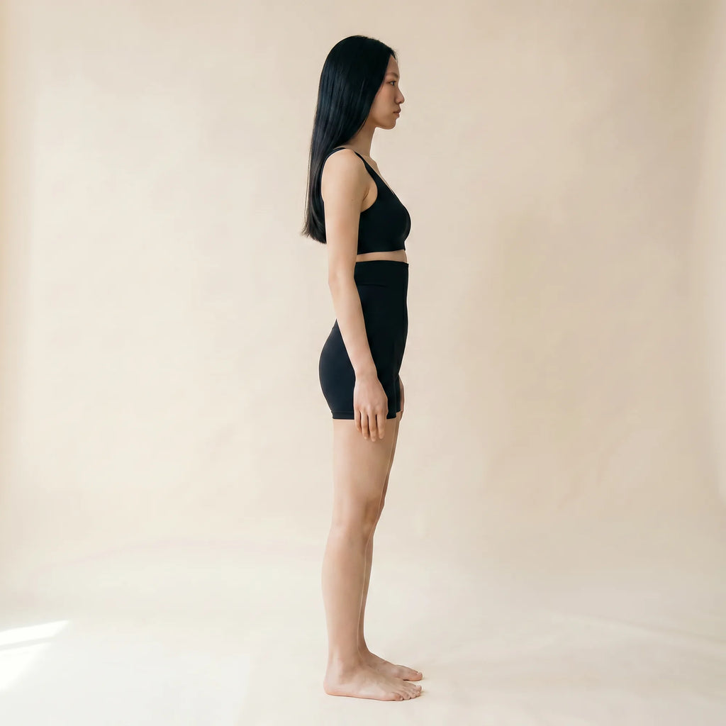 Panty gainant taille haute — vue de profil, silhouette galbée sans démarcation